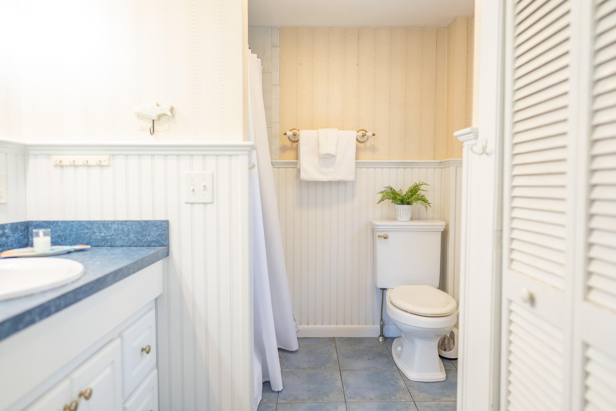 49 Monument View Road East Dennis, MA 02660 - Photo 36 of 52 a bathroom with a granite countertop sink toilet and shower