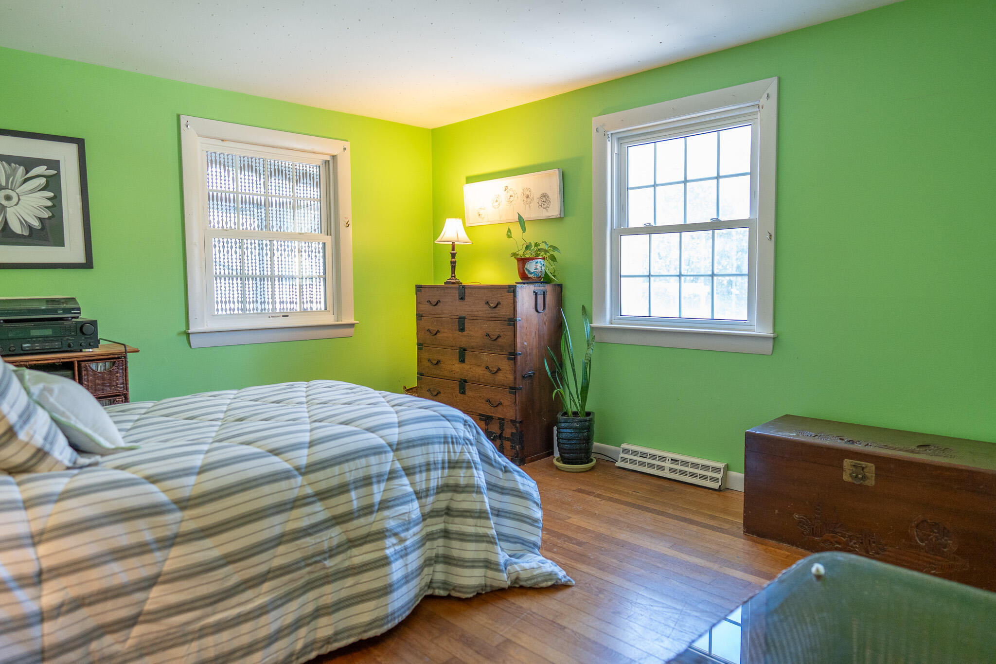 49 Monument View Road East Dennis, MA 02660 - Photo 38 of 52 a bedroom with a bed and windows