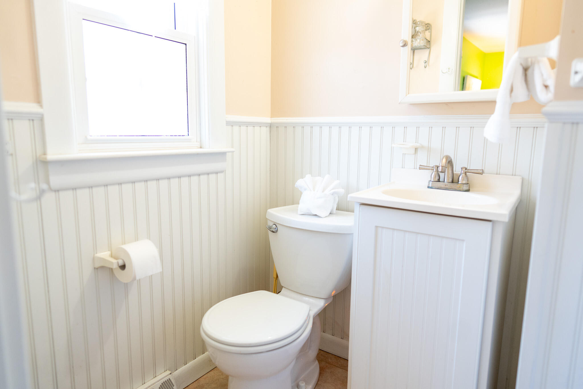 49 Monument View Road East Dennis, MA 02660 - Photo 41 of 52 a bathroom with a toilet sink and mirror