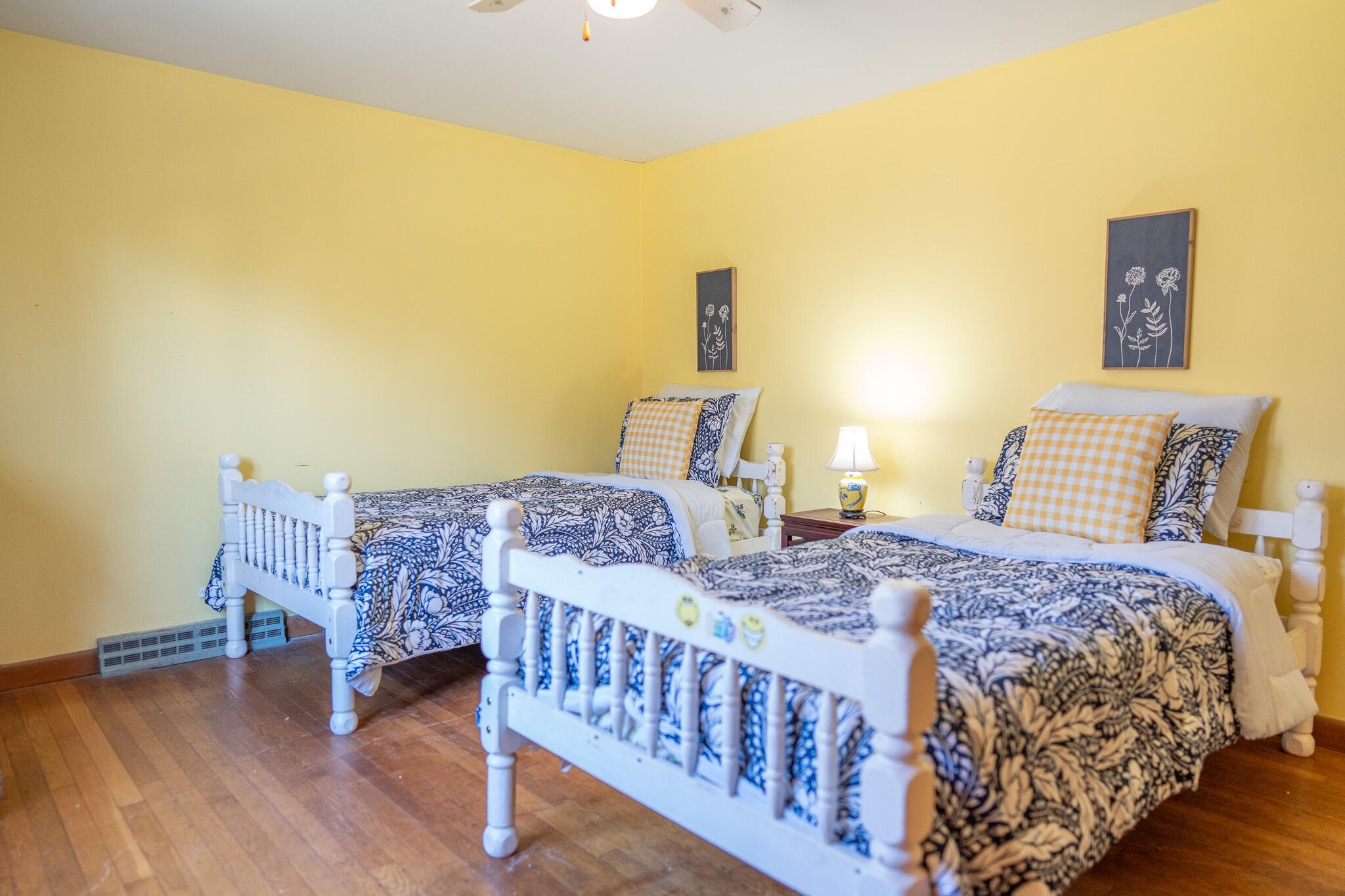 49 Monument View Road East Dennis, MA 02660 - Photo 42 of 52 a bedroom with a bed and wooden floor