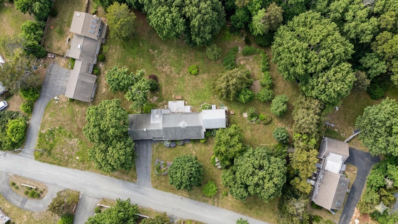 49 Monument View Road East Dennis, MA 02660 - Photo 6 of 52 an aerial view of a house with a yard