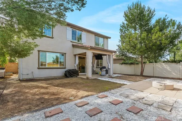 a view of a house with a patio