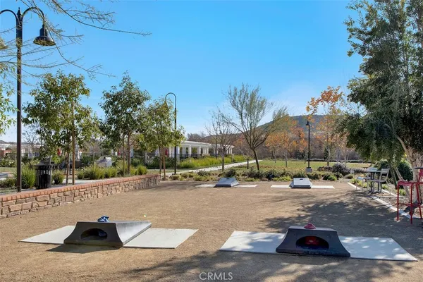 a view of chairs and tables in a patio