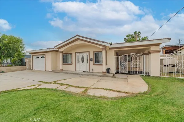 front view of a house with a patio