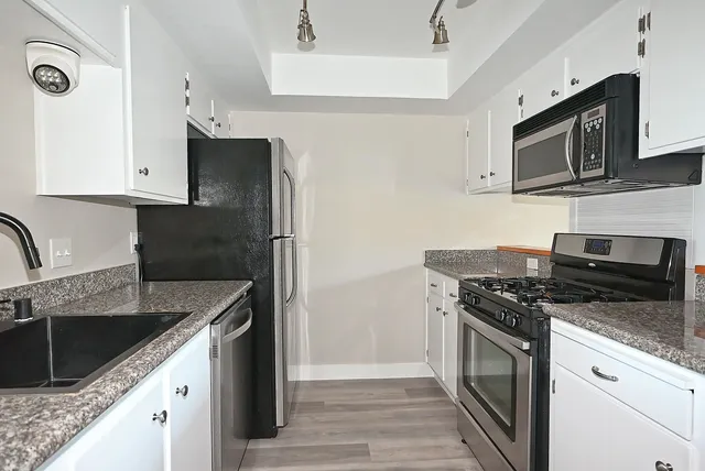 an outdoor view of house with a garden