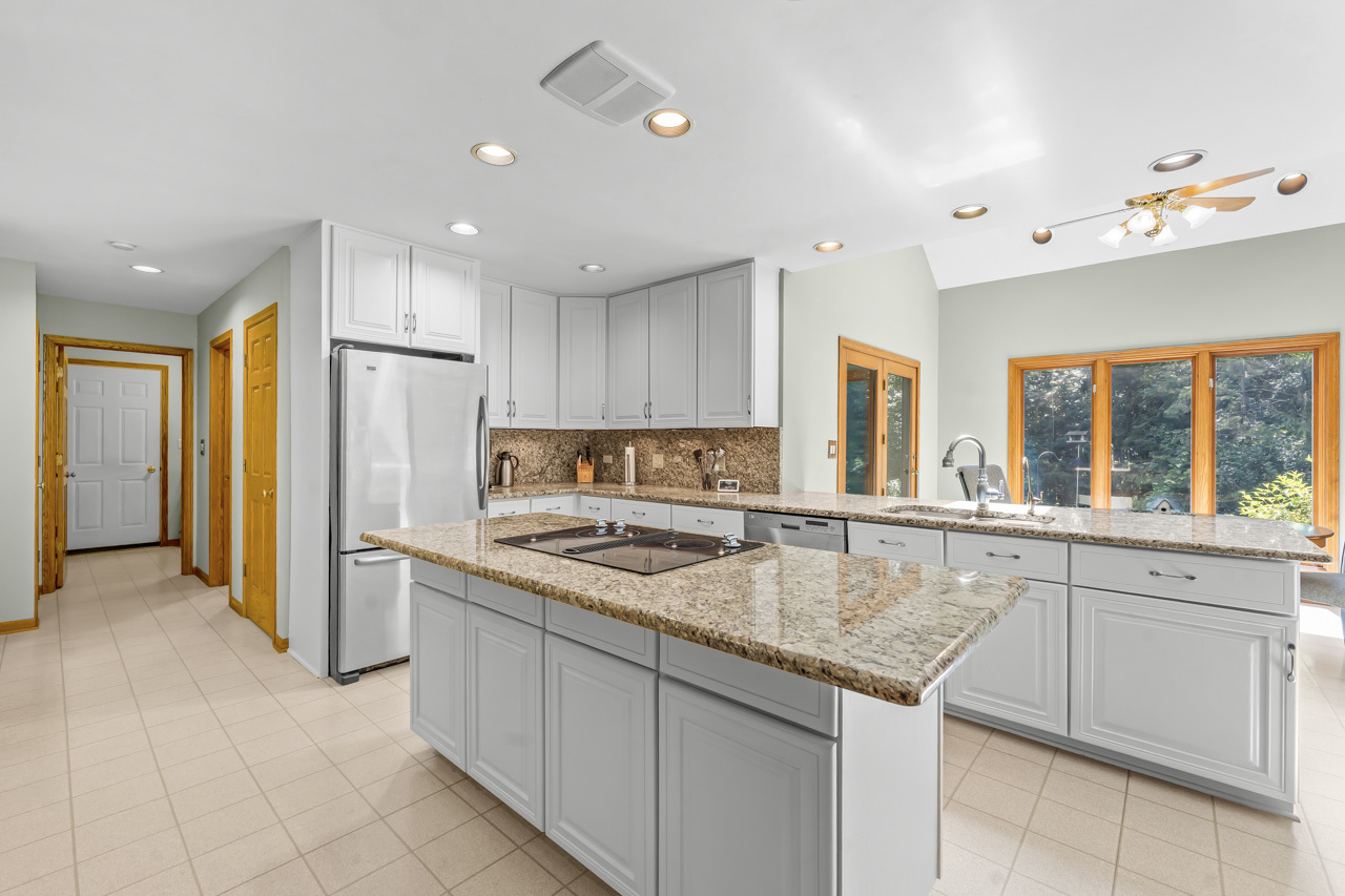 31W139 Rohrssen Road Hoffman Estates, IL 60192 - Photo 17 of 51 a kitchen with refrigerator and window