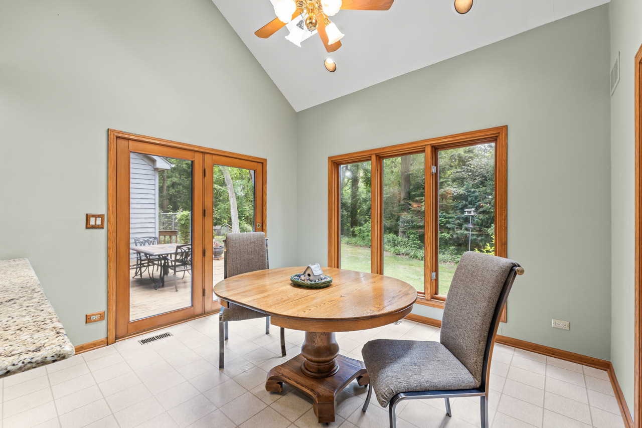 31W139 Rohrssen Road Hoffman Estates, IL 60192 - Photo 22 of 51 a view of a dining room with furniture window and outside view