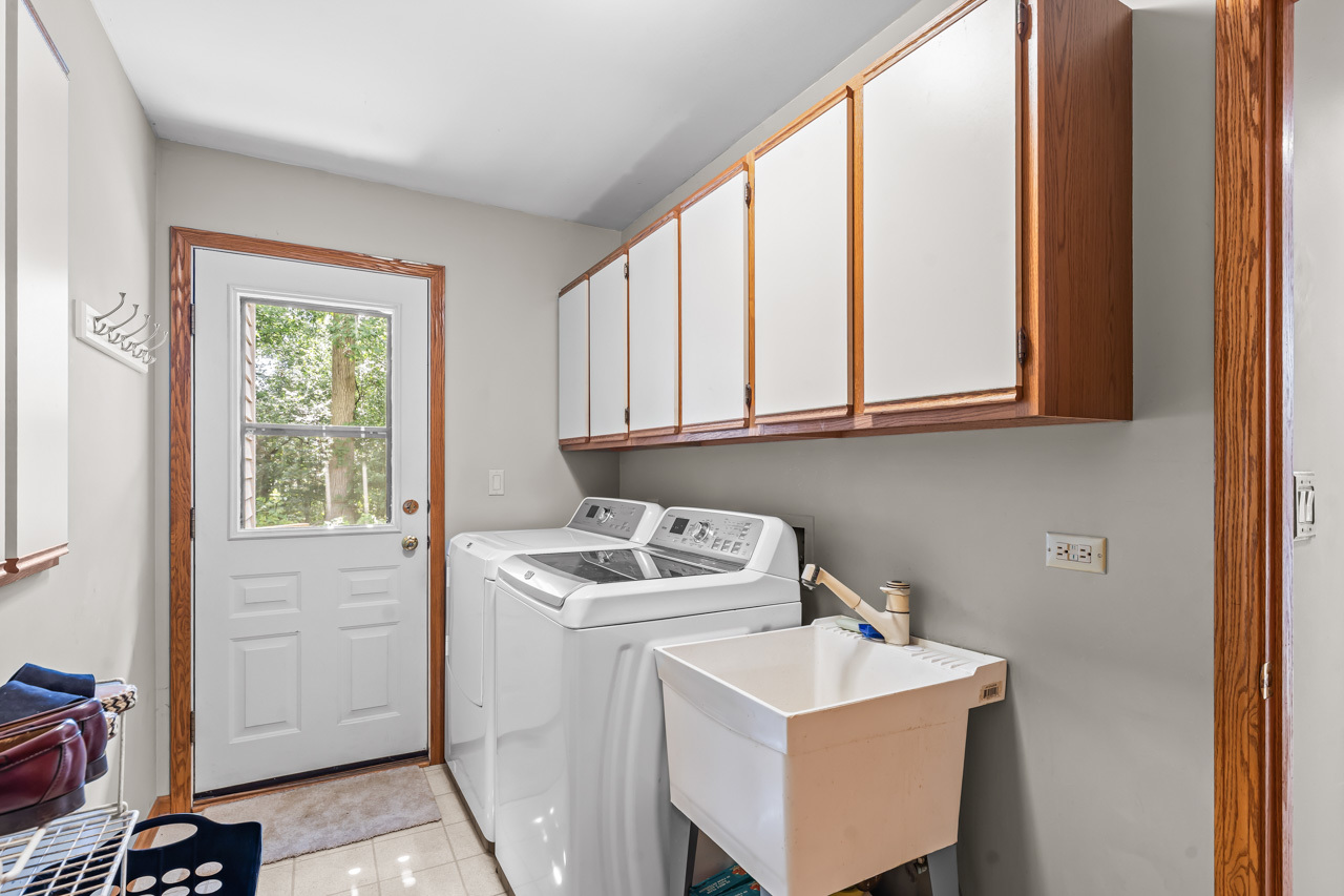 31W139 Rohrssen Road Hoffman Estates, IL 60192 - Photo 29 of 51 a room with storage and utility