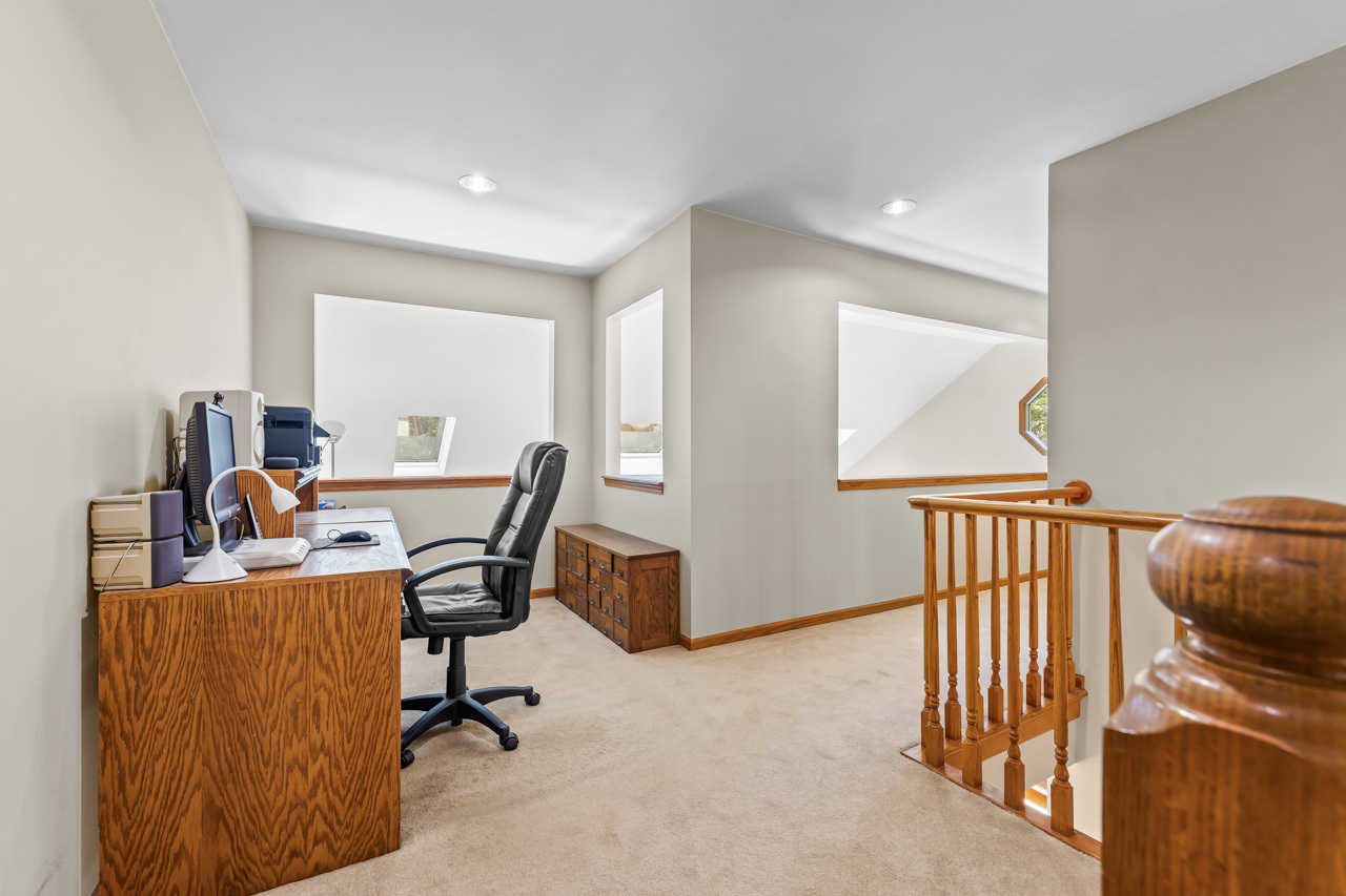 31W139 Rohrssen Road Hoffman Estates, IL 60192 - Photo 30 of 51 a workspace with furniture and a window
