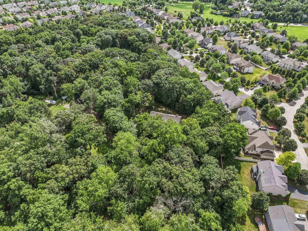 31W139 Rohrssen Road Hoffman Estates, IL 60192 - Photo 42 of 51 an aerial view of residential house with outdoor space and trees all around