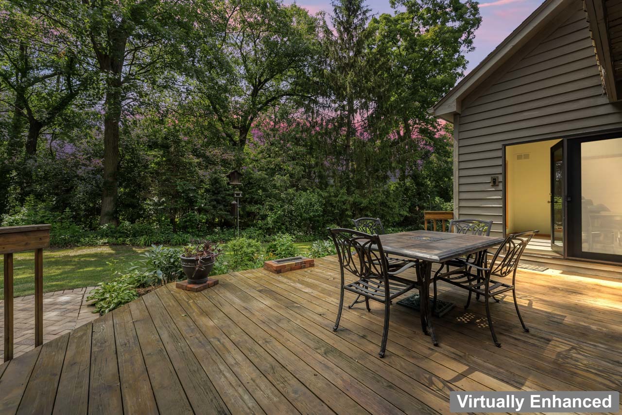 31W139 Rohrssen Road Hoffman Estates, IL 60192 - Photo 44 of 51 a backyard of a house with wooden floor table and chairs