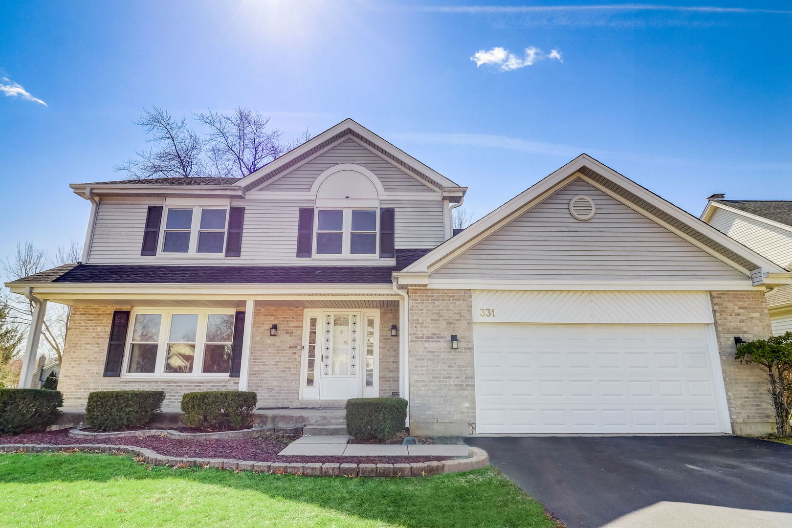 331 Sutcliffe Circle Vernon Hills, IL 60061 - Photo 1 of 26 a front view of a house with a yard