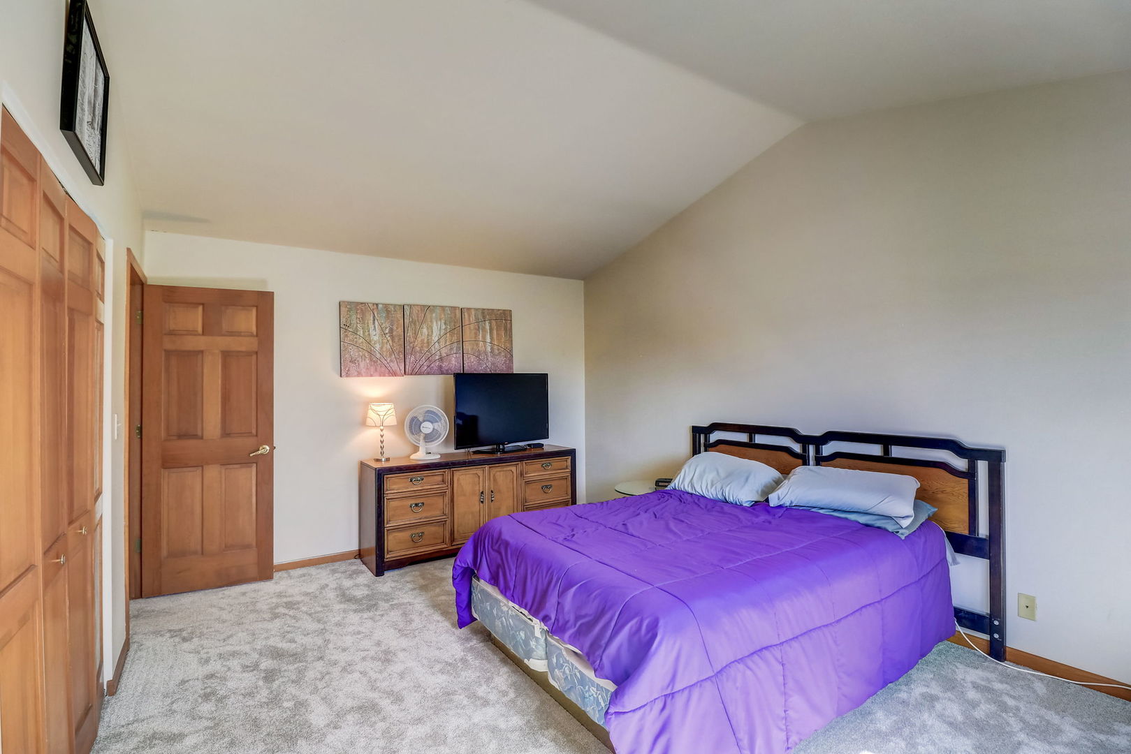 331 Sutcliffe Circle Vernon Hills, IL 60061 - Photo 11 of 26 a bedroom with a bed and a flat screen tv