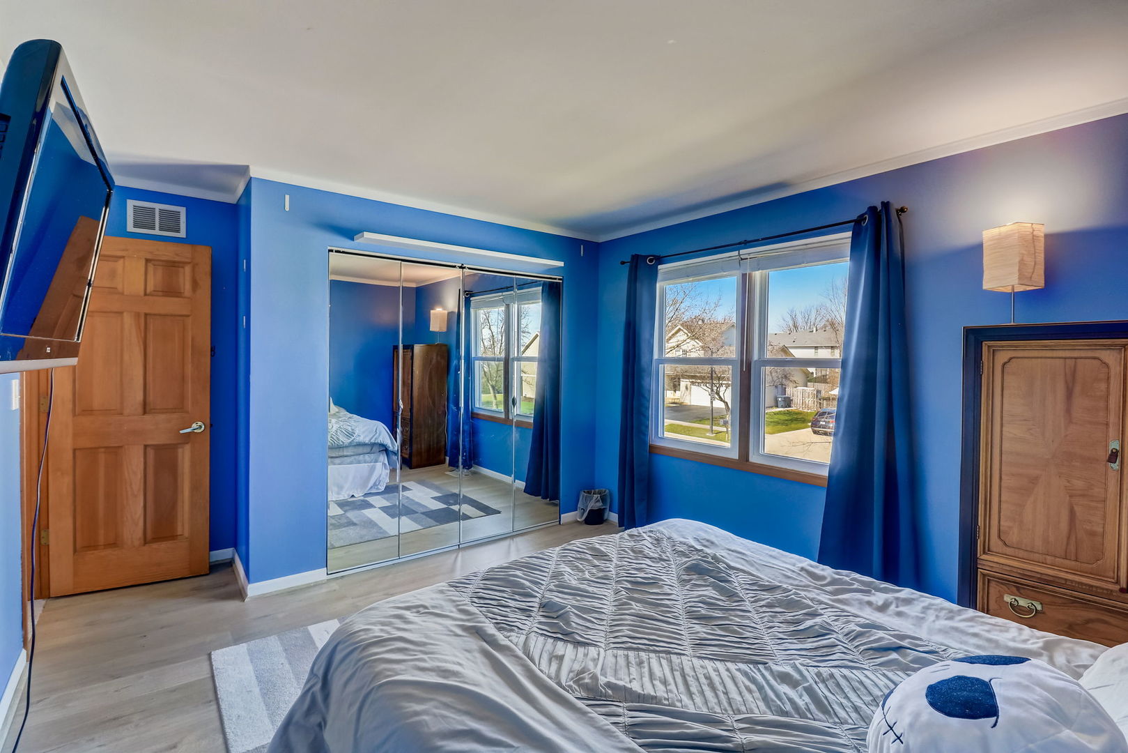 331 Sutcliffe Circle Vernon Hills, IL 60061 - Photo 16 of 26 a bedroom with a bed and a dresser next to a window