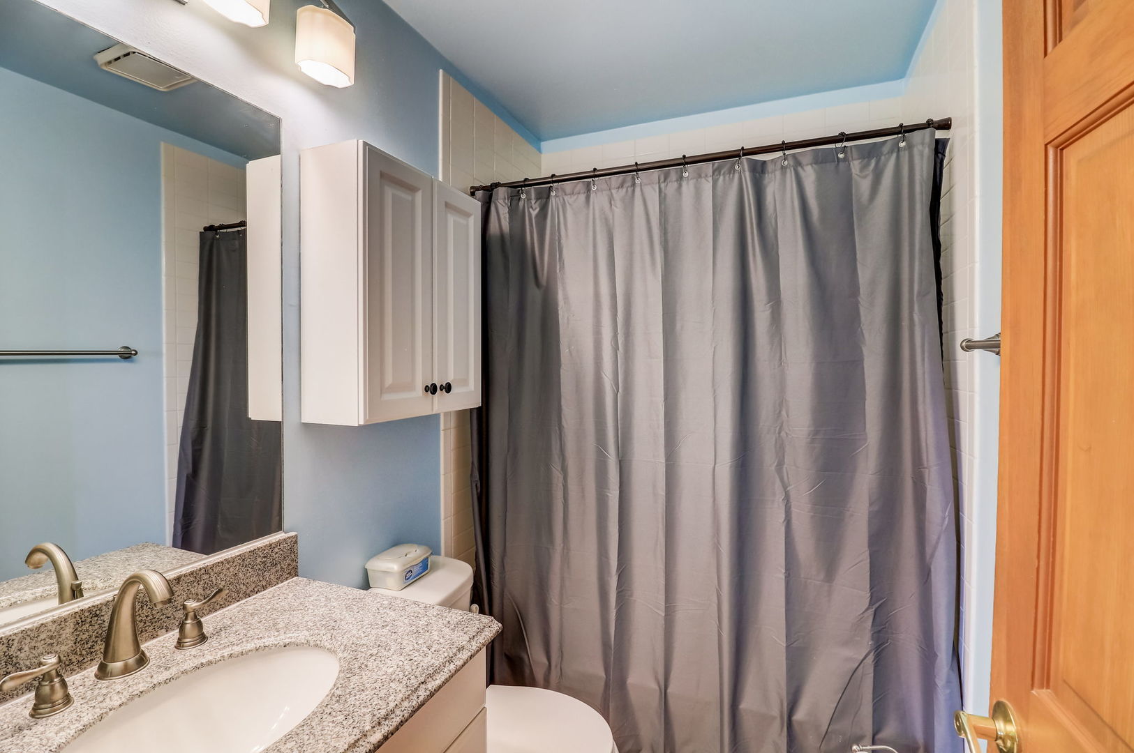 331 Sutcliffe Circle Vernon Hills, IL 60061 - Photo 20 of 26 a bathroom with a granite countertop sink and a mirror