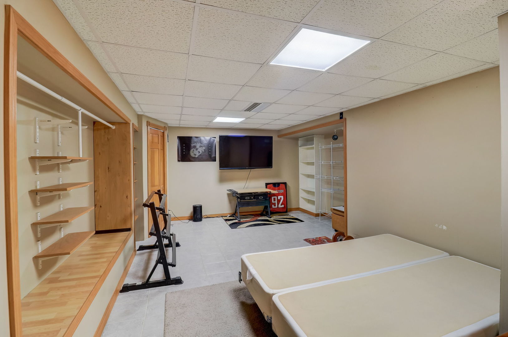 331 Sutcliffe Circle Vernon Hills, IL 60061 - Photo 21 of 26 a room with gym equipment and a large window