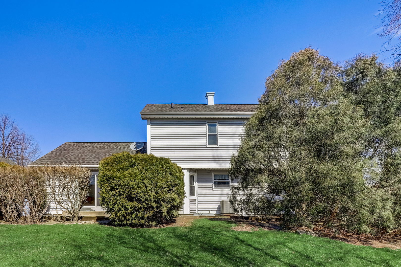331 Sutcliffe Circle Vernon Hills, IL 60061 - Photo 23 of 26 a view of a house with a yard and plants