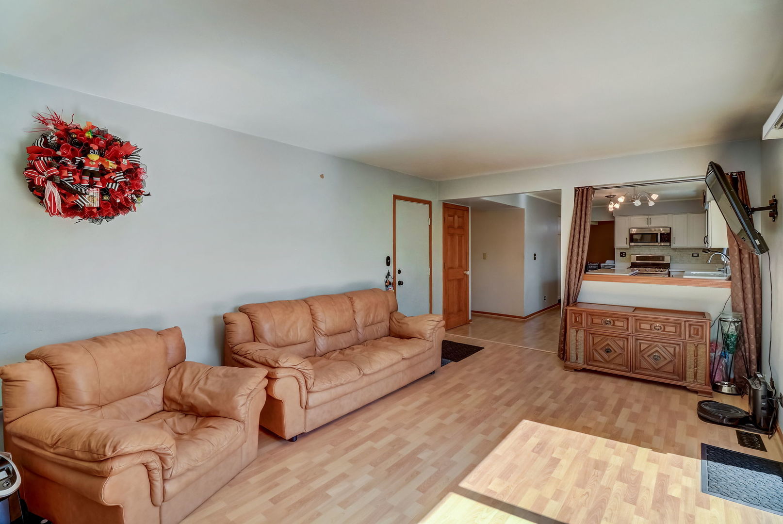 331 Sutcliffe Circle Vernon Hills, IL 60061 - Photo 7 of 26 a living room with furniture and a flat screen tv