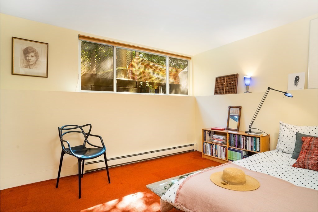 4 Ellery Square Cambridge, MA 02138 - Photo 18 of 23 a bedroom with a bed and furniture