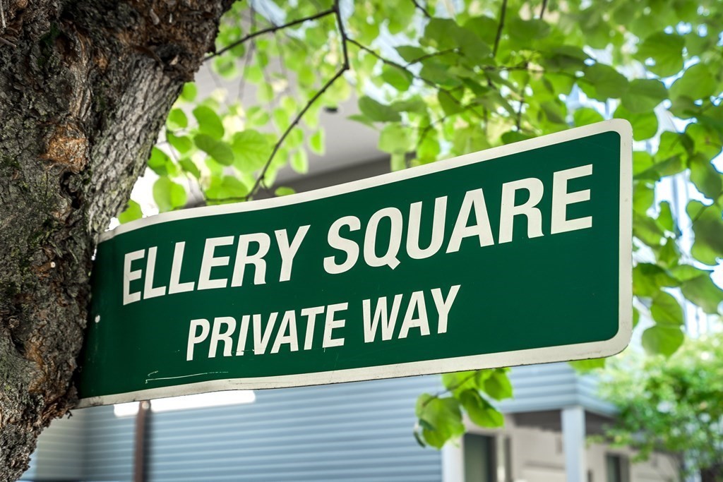 4 Ellery Square Cambridge, MA 02138 - Photo 19 of 23 a sign that is on a wooden wall