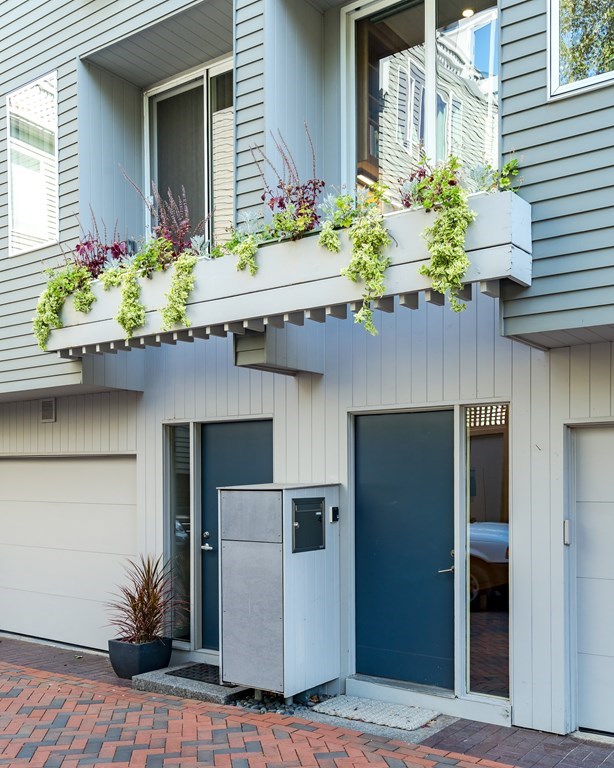4 Ellery Square Cambridge, MA 02138 - Photo 2 of 23 a front view of a house with an outdoor space
