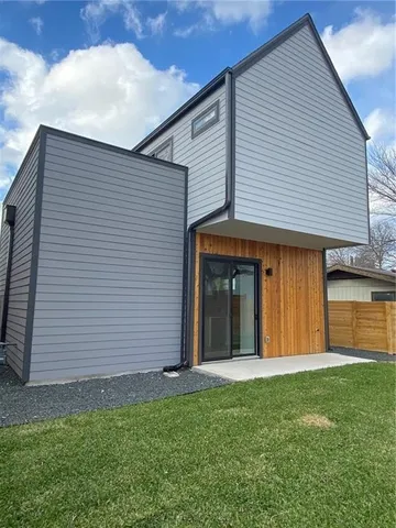 a view of a backyard with a garden