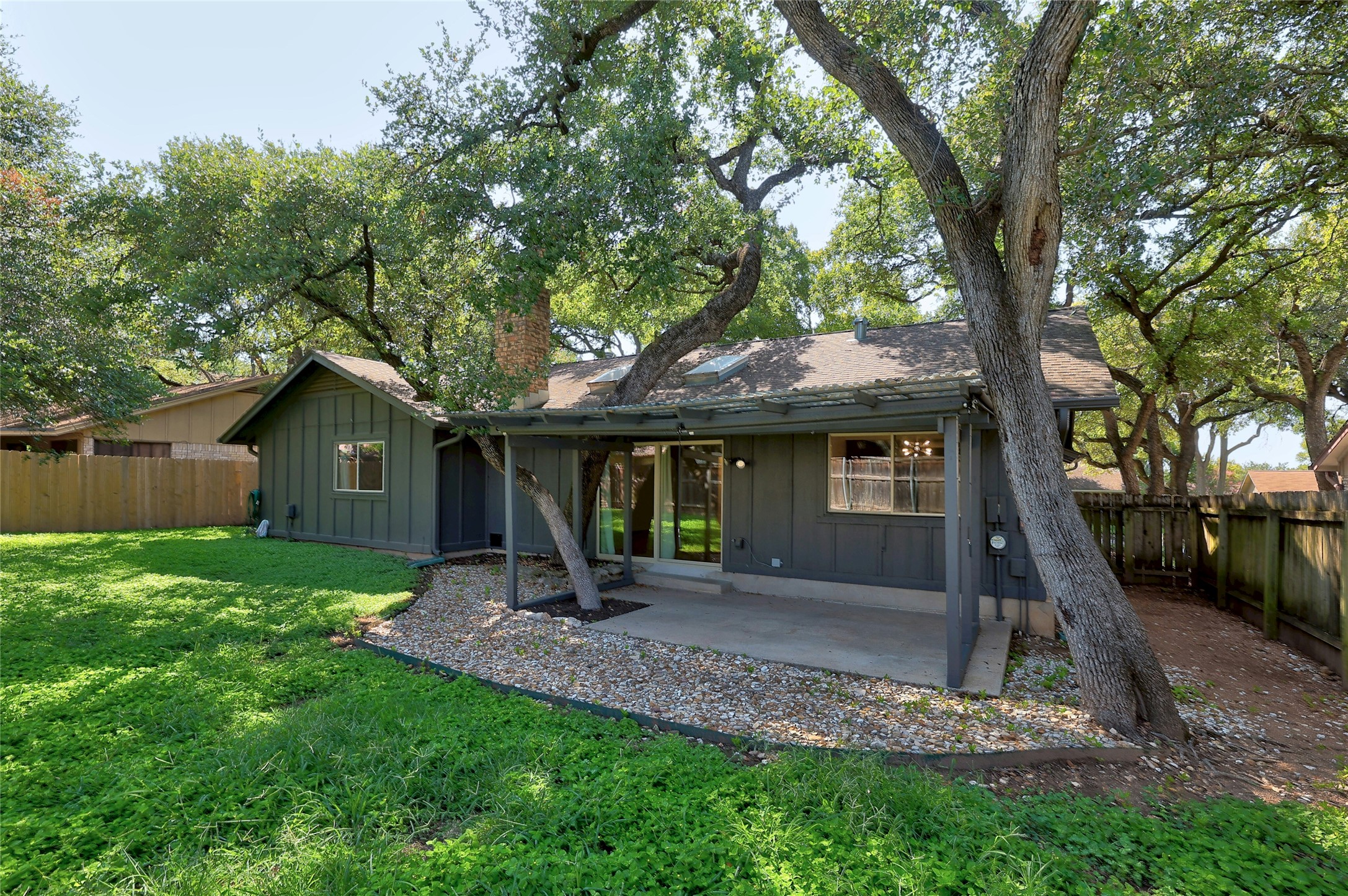 11720 Running Fox Trail Austin, TX 78759 - Photo 27 of 31 a view of a house with a yard and tree