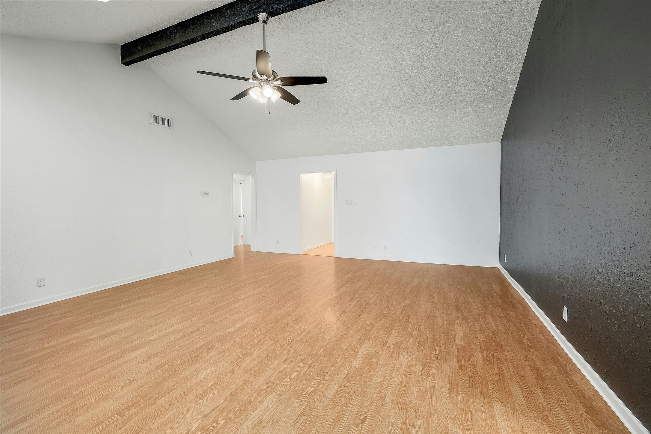 11720 Running Fox Trail Austin, TX 78759 - Photo 5 of 31 a view of empty room with wooden floor