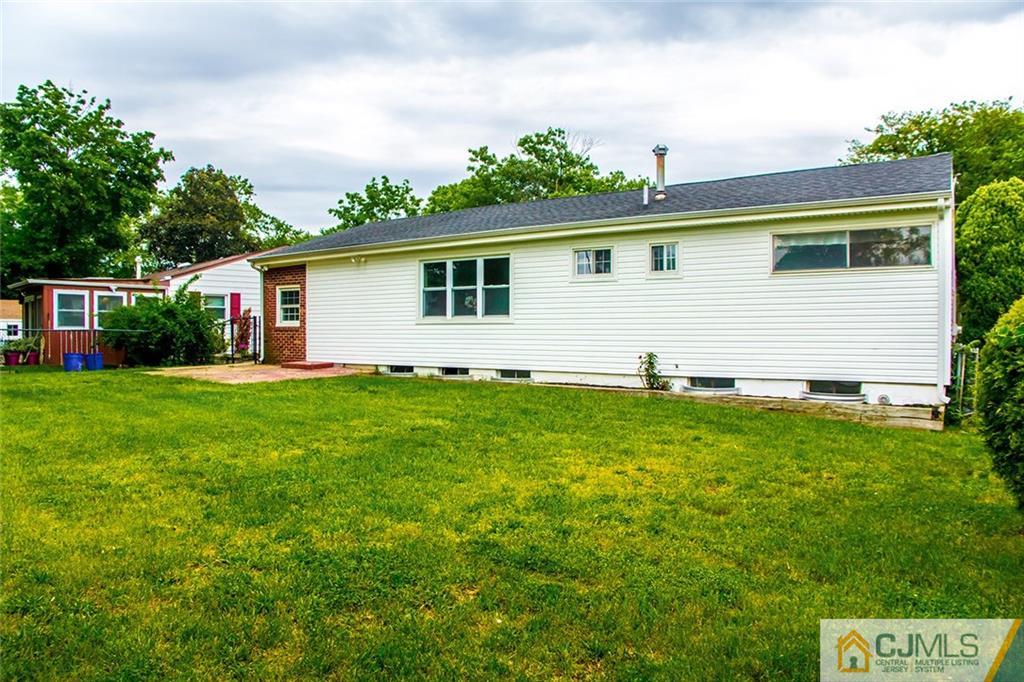 5 Brandeis Road Old Bridge, NJ 08859 - Photo 22 of 25 a view of a house with a backyard