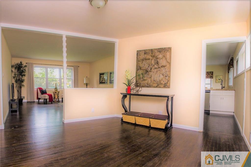5 Brandeis Road Old Bridge, NJ 08859 - Photo 8 of 25 a view of an empty room and wooden floor
