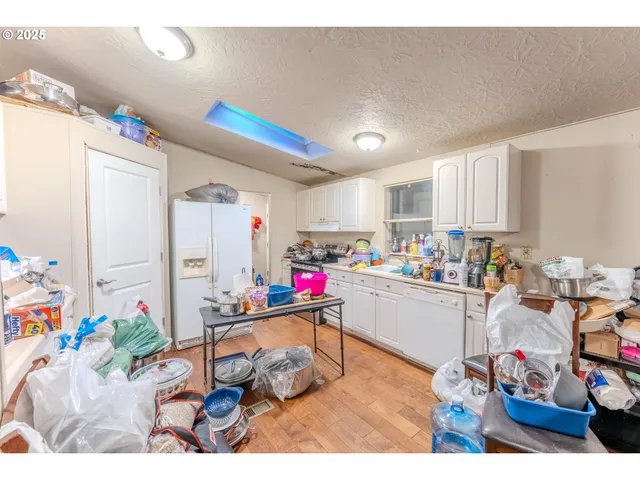 a room with furniture and appliances