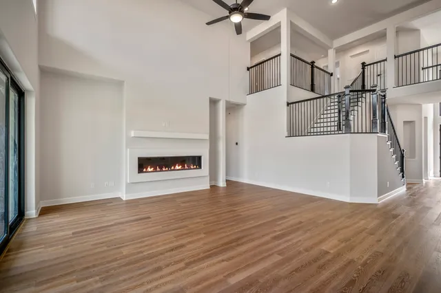 a view of a kitchen with wooden floor