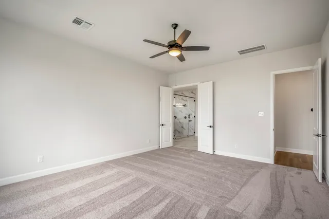 a bathroom with a bathtub and a sink