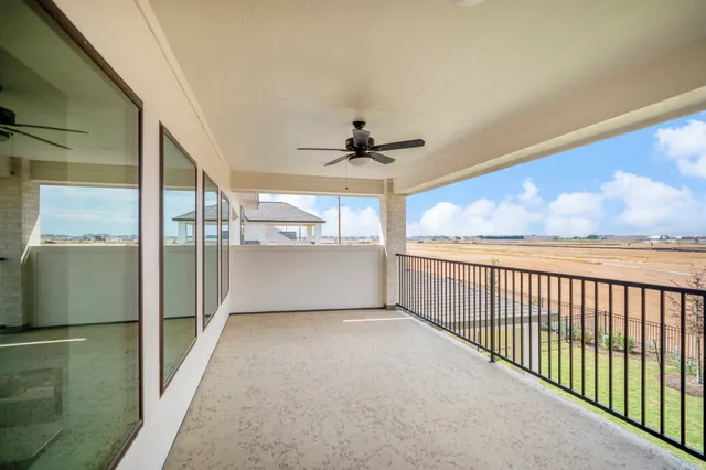 a view of a big room with windows