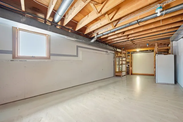 a view of a room with wooden walls