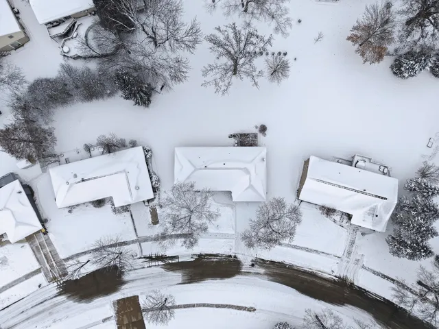 an aerial view of residential house with outdoor space