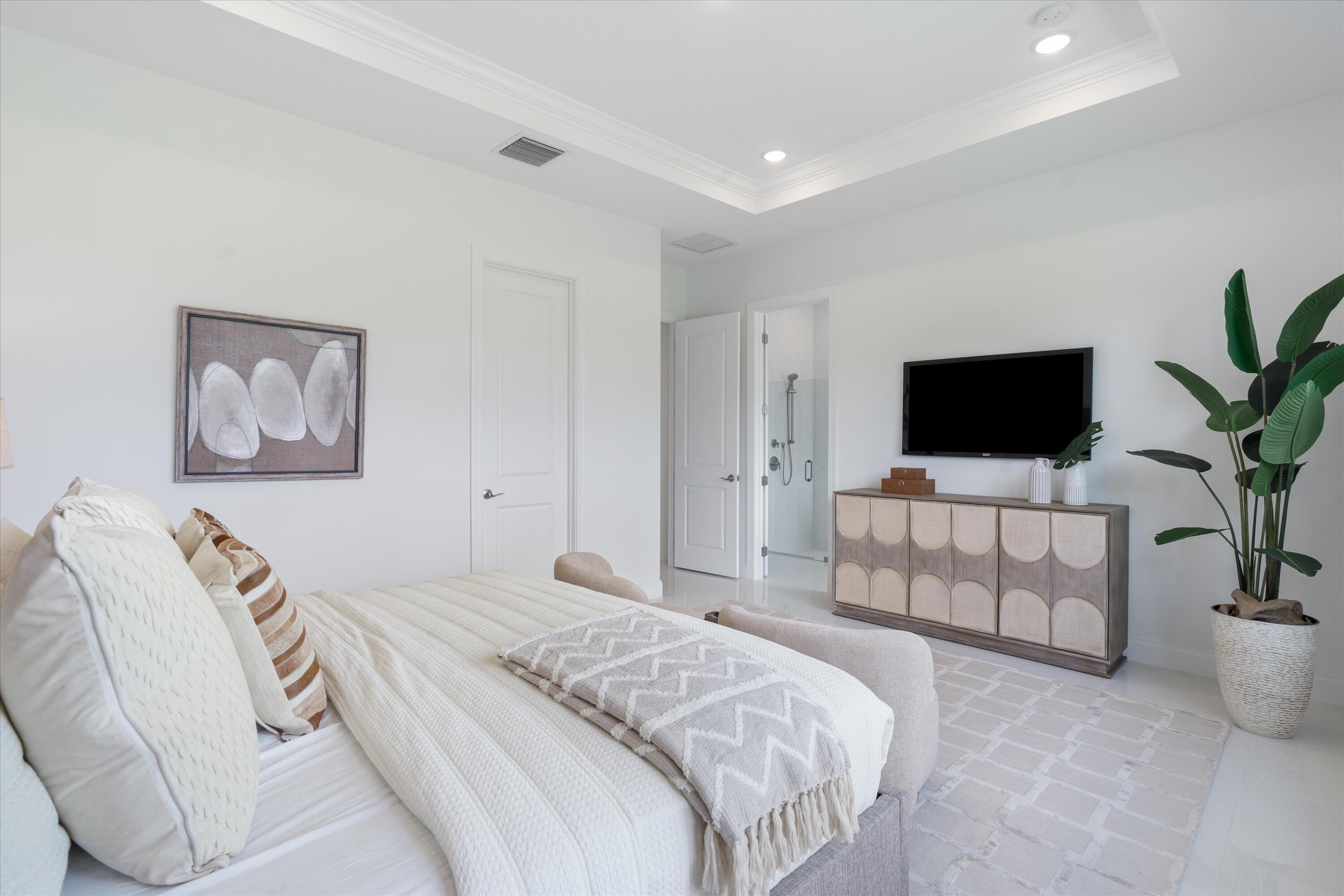 6783 Southeast Pine Drive Stuart, FL 34997 - Photo 18 of 24 Primary Bedroom