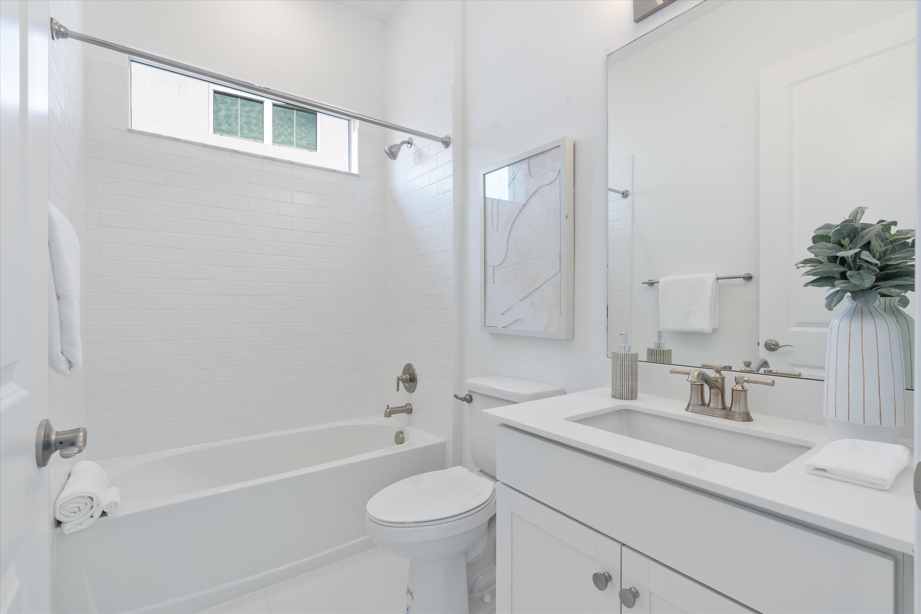 6783 Southeast Pine Drive Stuart, FL 34997 - Photo 3 of 24 Hall Bath