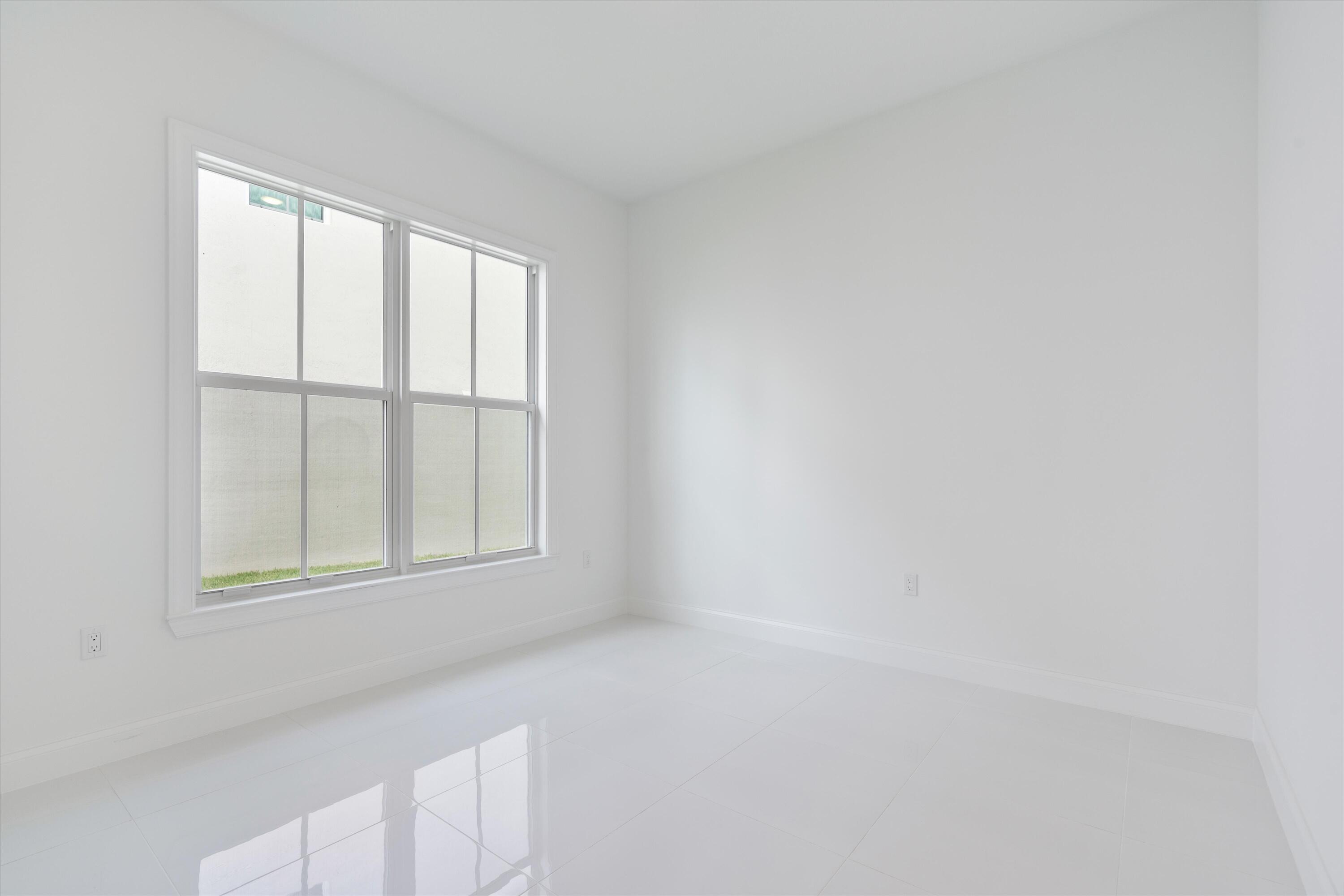 6783 Southeast Pine Drive Stuart, FL 34997 - Photo 4 of 24 Bedroom 3
