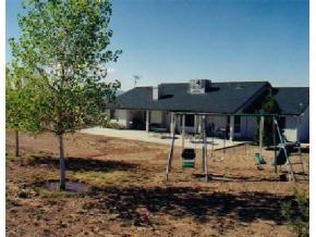 9397 East Mountain Vw Road Prescott Valley, AZ 86315 - Photo 5 of 12 a view of a house with backyard