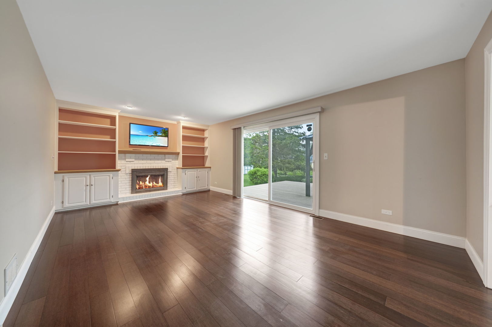 4977 Prairie Oak Road Gurnee, IL 60031 - Photo 12 of 26 a living room with furniture and a fireplace