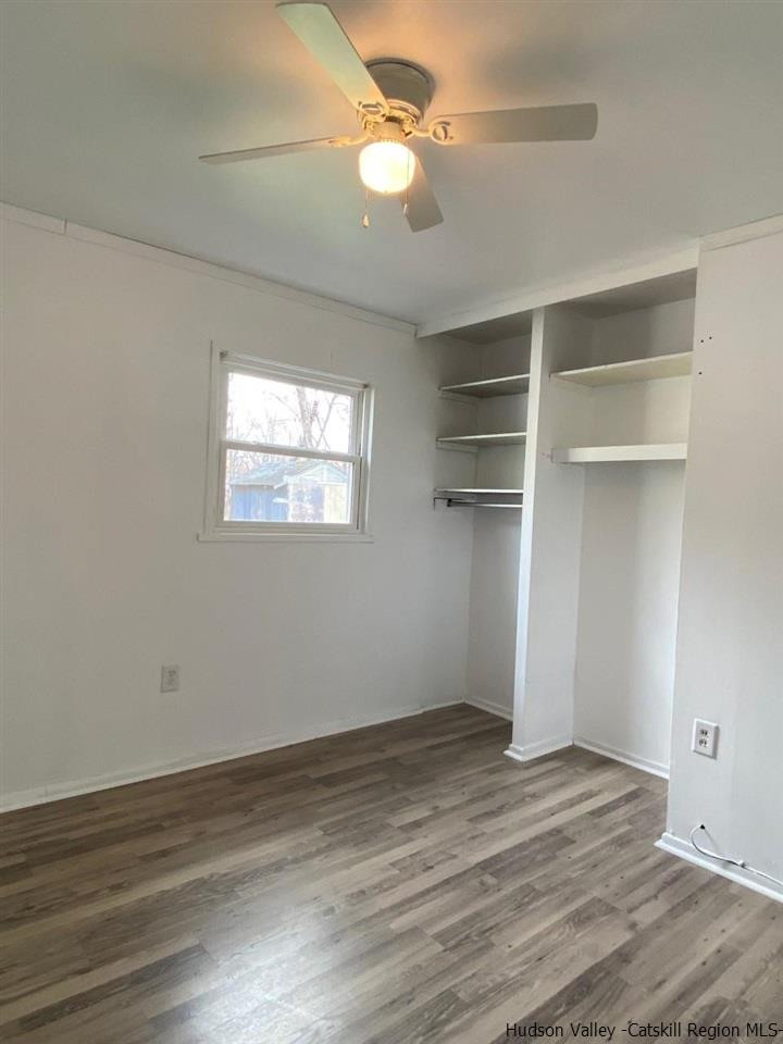 5 South Road, Unit HIGH FALLS PARK High Falls, NY 12440 - Photo 6 of 14 a view of an empty room with a window and wooden floor