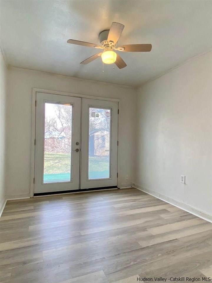 5 South Road, Unit HIGH FALLS PARK High Falls, NY 12440 - Photo 9 of 14 an empty room with wooden floor and windows