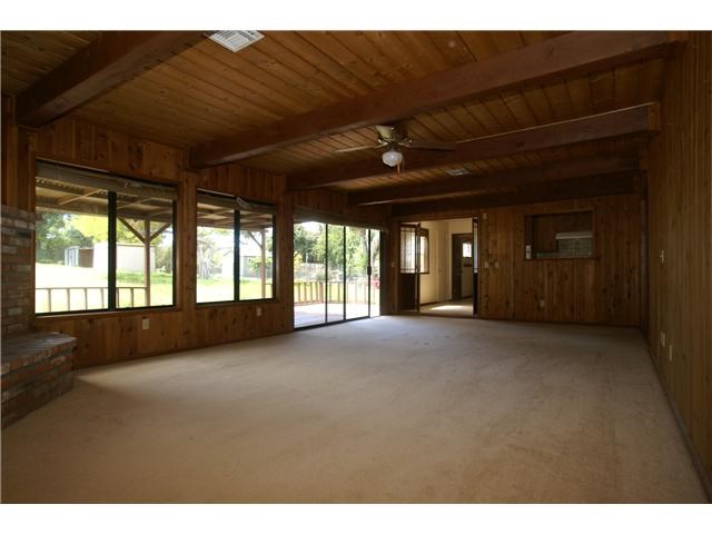 a view of large room with large windows