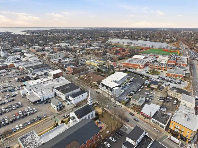 an aerial view of a city with lots of residential buildings