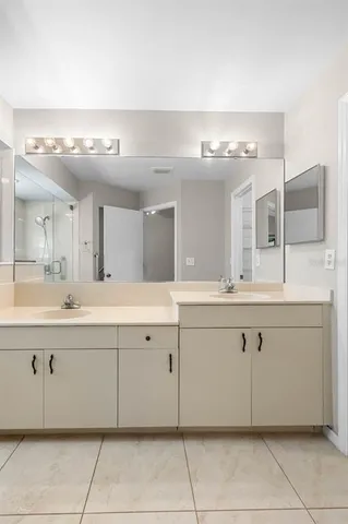 an aerial view of residential house with outdoor space and swimming pool