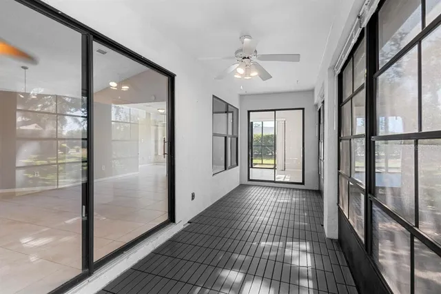 a view of a living room and window