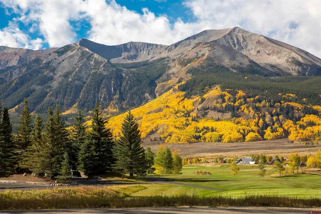 a view of swimming pool with an outdoor seating