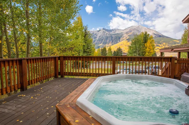 a view of swimming pool with a yard