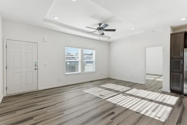 a view of an empty room with a window